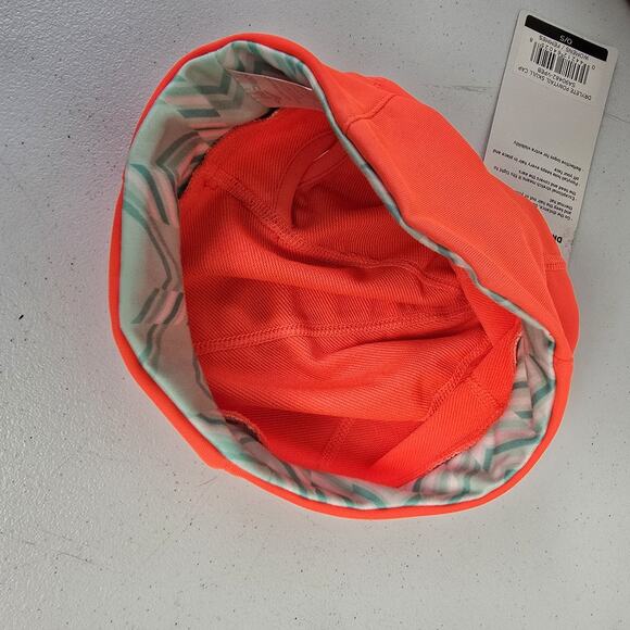 Saucony Hat Womens Neon Coral Drylete Ponytail Skull Cap NWT Running Outdoors - Picture 4 of 8